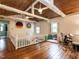 Large bonus room features a wooden ceiling, instruments, and windows allowing light to brighten the space at 183 Birnamwood Dr, Chapel Hill, NC 27516