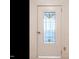 White door with stained glass insert adds character to the room at 183 Birnamwood Dr, Chapel Hill, NC 27516