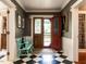Welcoming foyer showcasing the detailed woodwork and traditional design elements at 183 Birnamwood Dr, Chapel Hill, NC 27516