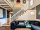 Bright living room features a staircase, and comfortable seating, perfect for relaxing or entertaining at 183 Birnamwood Dr, Chapel Hill, NC 27516