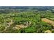 Overhead image displaying the secluded nature of a large home hidden amongst dense green trees at 1852 Gwyn Rd, Burlington, NC 27217