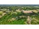 A beautiful aerial view of a home and land with pond at 1852 Gwyn Rd, Burlington, NC 27217