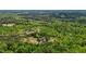 A beautiful aerial view of a home surrounded by lush greenery at 1852 Gwyn Rd, Burlington, NC 27217