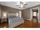 Bedroom with neutral paint, hardwood floors and an open doorway into another room at 1852 Gwyn Rd, Burlington, NC 27217