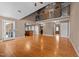 Light-filled living room with hardwood floors, neutral paint and an open floor plan at 1852 Gwyn Rd, Burlington, NC 27217