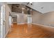 Spacious living room with hardwood floors and a vaulted ceiling, perfect for entertaining guests at 1852 Gwyn Rd, Burlington, NC 27217