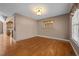 Bright room featuring hardwood floors, neutral paint, natural light from the window, and recessed lighting at 1852 Gwyn Rd, Burlington, NC 27217