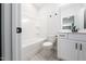 Cozy bathroom featuring a tub/shower combo, white cabinets, and a toilet at 20 Scotland Dr, Youngsville, NC 27596