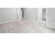 Spacious carpeted bedroom with access to walk-in closet and bathroom doors at 20 Scotland Dr, Youngsville, NC 27596