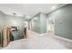 Spacious upstairs hallway with carpet, neutral paint, and views into other rooms at 20 Scotland Dr, Youngsville, NC 27596