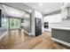 Open-concept kitchen with white cabinets, modern appliances, and a spacious layout at 20 Scotland Dr, Youngsville, NC 27596