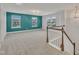 The upstairs bonus room is spacious and bright with a large window at 2018 Morehead Hill Ct, Durham, NC 27703