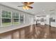 The large living room features lots of natural light from the windows at 2018 Morehead Hill Ct, Durham, NC 27703