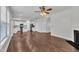 Open-concept living room with hardwood floors flows seamlessly to the kitchen at 2018 Morehead Hill Ct, Durham, NC 27703