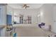 Large bonus room features seating, shelves, toys and ceiling fan at 208 Cecelia Ct, Cary, NC 27519