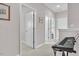 Well-lit upper hallway with multiple doors and a keyboard offering potential for a music or office area at 208 Cecelia Ct, Cary, NC 27519