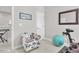 Bright workout room with an exercise bike and mirror at 208 Cecelia Ct, Cary, NC 27519