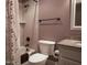 Bathroom with shower/tub, toilet, vanity, and granite counters at 2109 Taramar Ln, Zebulon, NC 27597