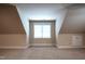 Bonus room with carpet and dormer windows for extra light at 2109 Taramar Ln, Zebulon, NC 27597