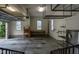Spacious two-car garage with workbench, storage shelving, and ample space for parking at 2109 Taramar Ln, Zebulon, NC 27597