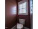 Small powder room featuring a toilet and a window with blinds at 2109 Taramar Ln, Zebulon, NC 27597