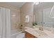 Bright bathroom features a tub and sink at 220 Cole Valley Dr, Cary, NC 27513
