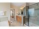 Bathroom featuring a glass shower, vanity with a light wood cabinet, and a toilet area at 220 Cole Valley Dr, Cary, NC 27513