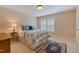Serene bedroom with a window, offering a comfortable and relaxing space at 220 Cole Valley Dr, Cary, NC 27513