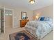 Bright bedroom featuring a doorway and a window at 220 Cole Valley Dr, Cary, NC 27513