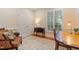 Cozy office space with neutral walls, plantation shutters, and a decorative rug at 220 Cole Valley Dr, Cary, NC 27513