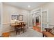 Bright office featuring hardwood floors and French doors leading to living area at 220 Cole Valley Dr, Cary, NC 27513