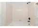 Bathroom shower and tub with light pink tiling at 2201 Alpine Rd, Durham, NC 27707