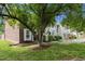 Green grass and meticulously arranged mulch beds add curb appeal to the exteriors of the townhomes at 2201 Alpine Rd, Durham, NC 27707