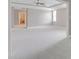 Large bedroom with a ceiling fan, trey ceiling, and plush carpet at 225 Norwalk St, Holly Springs, NC 27540