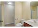 Bathroom featuring a single vanity, toilet, and a shower with sliding glass doors at 229 Michigan Ave, Cary, NC 27519