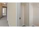 Walk-in closet showcases wire shelving for optimal storage solutions; access to bedroom at 229 Michigan Ave, Cary, NC 27519