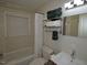 Bathroom features a shower and tub combination and a single sink vanity at 2409 Derby Dr, Raleigh, NC 27610