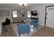 Stylish open-concept living space with a bright atmosphere, stylish décor, and a seamless flow at 2409 Derby Dr, Raleigh, NC 27610