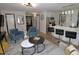 Inviting living room seamlessly connected to a modern kitchen, perfect for entertaining at 2409 Derby Dr, Raleigh, NC 27610
