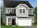 Charming two-story home with a two-car garage and stone accents at 243 Steel Springs Ln # 25, Angier, NC 27501
