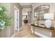 Welcoming hallway with light-colored flooring and decor, leading to the kitchen at 243 Steel Springs Ln # 25, Angier, NC 27501