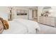 Comfortable main bedroom suite with a stylish dresser and calming decor at 243 Steel Springs Ln # 25, Angier, NC 27501
