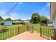 A wood deck looking out to the fenced backyard at 2527 Ossipee Front St, Elon, NC 27244