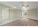 Bedroom featuring neutral carpet, a ceiling fan, a window and built in storage at 2527 Ossipee Front St, Elon, NC 27244