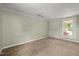 Cozy bedroom with natural light from the window overlooking the neighborhood at 2527 Ossipee Front St, Elon, NC 27244