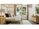 Serene bedroom with a four-poster bed, soft lighting, and tasteful decor, perfect for relaxation and peaceful nights at 2924 Ocean Sunrise Dr, Wake Forest, NC 27587