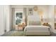 Well-decorated bedroom with a upholstered headboard, stylish nightstands, and decorative wall art at 2924 Ocean Sunrise Dr, Wake Forest, NC 27587