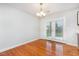 Dining room with hardwood floors and a sliding glass door leading to the outside at 3306 Woodland Park Rd, Durham, NC 27703