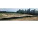 Future home construction site featuring a clear view of the lot, foundation work, and utilities installed at 37 Matthew Meadow Ln, Lillington, NC 27546