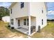 Charming home featuring a cozy back porch, perfect for relaxation, and a well-maintained exterior with manicured garden at 4097 Cordiality Church Rd, Nashville, NC 27856